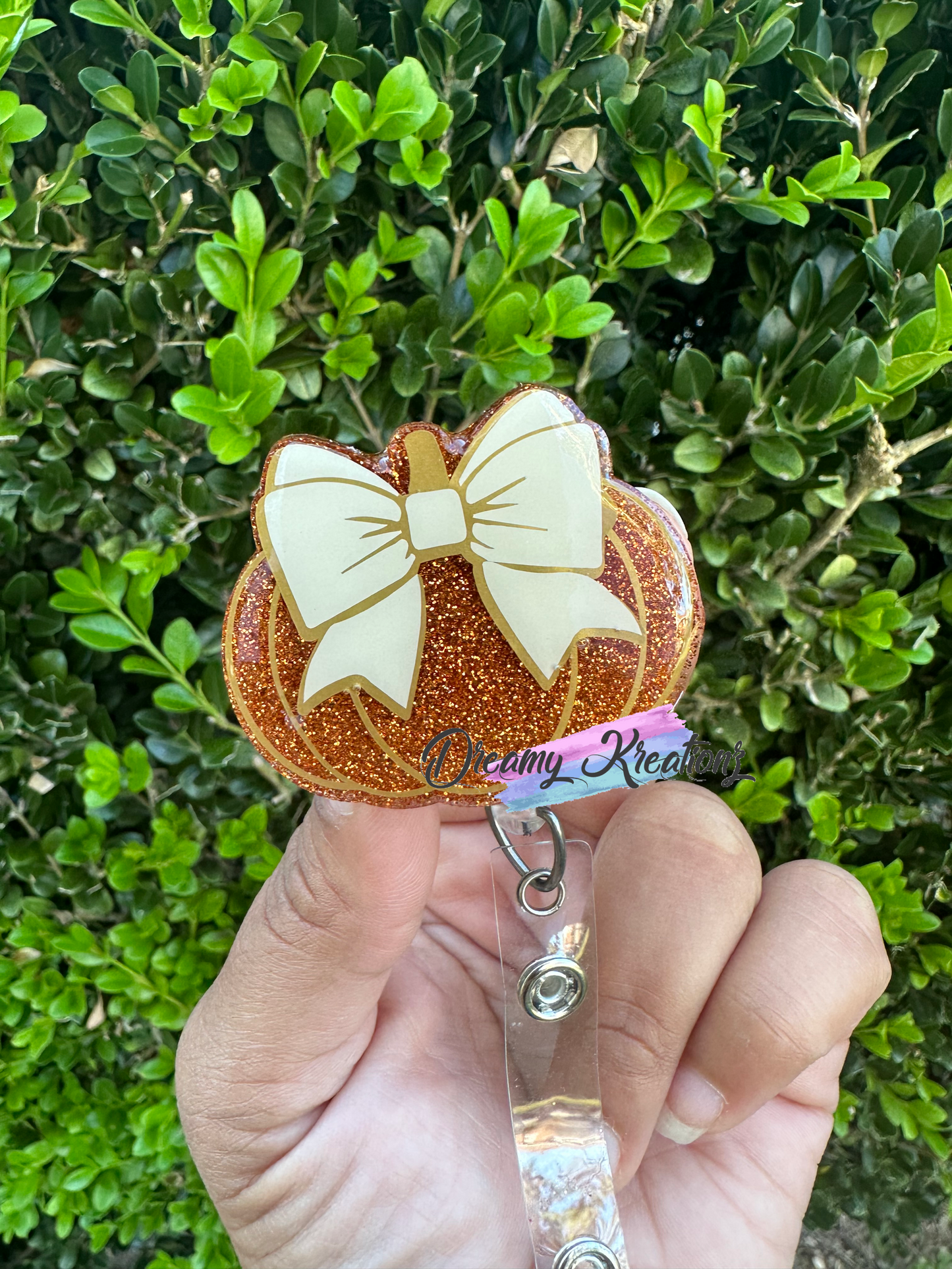 Pumpkin with bow badge reel